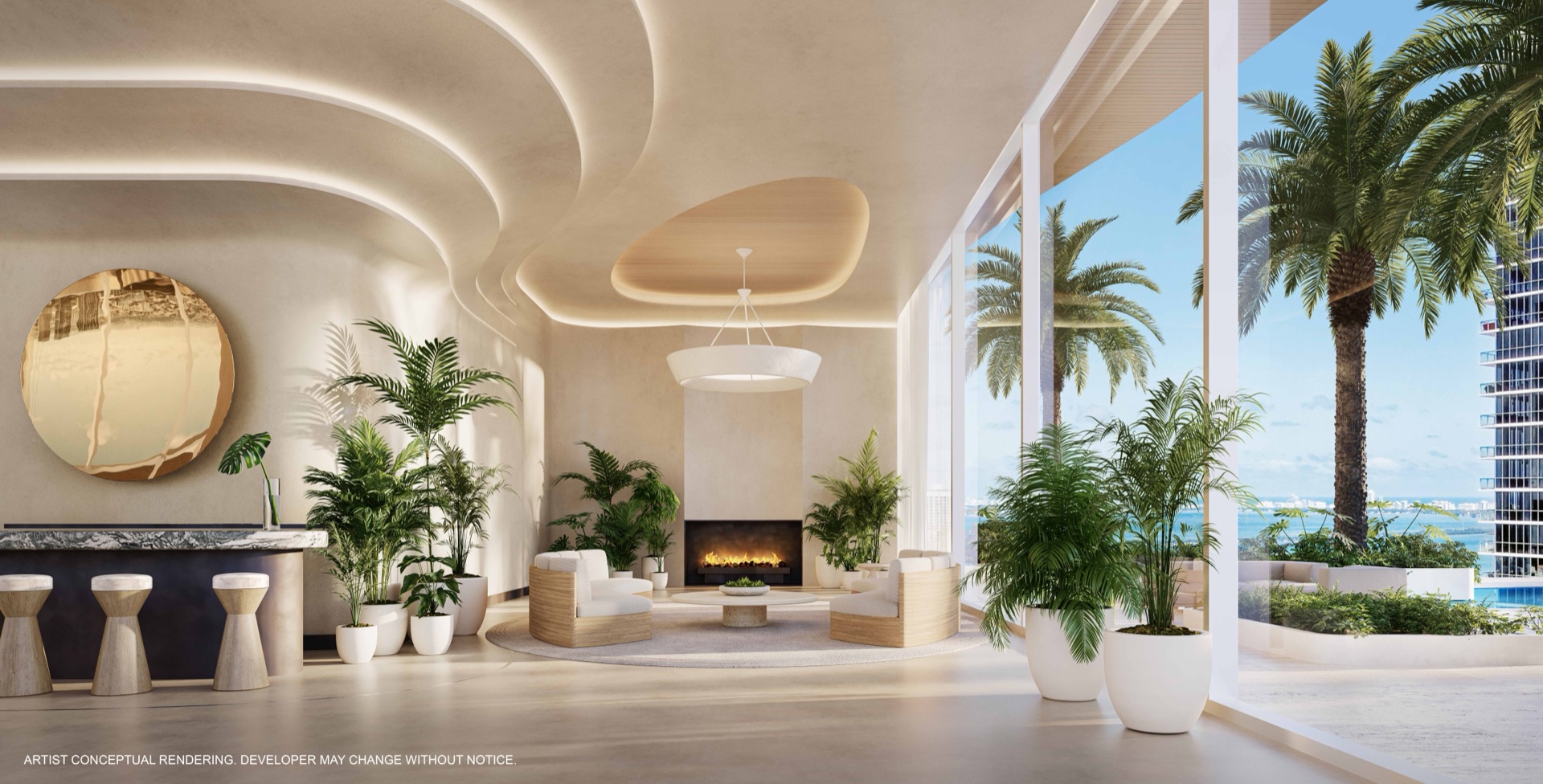 The indoor Sky Lounge at JEM Residences Miami — a feature fireplace, custom stone bar, and intimate seating areas with direct access to the outdoor amenity deck on the JEM Club floor.