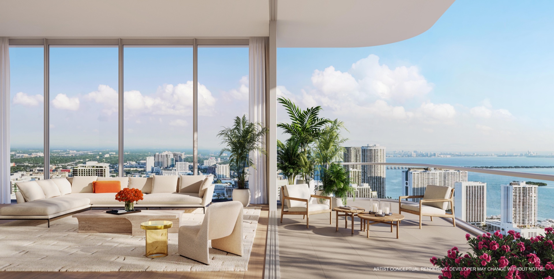 Living room at JEM Residences Miami — floor-to-ceiling impact glass framing Biscayne Bay and the Miami skyline, white oak flooring, and a tiled terrace beyond. Interiors by Rockwell Group.